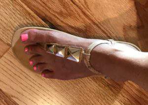 Gold sandals and pink toenails