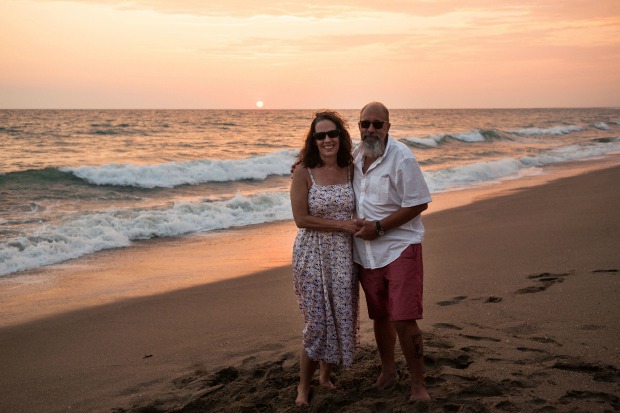 Couple on the beach at sunset