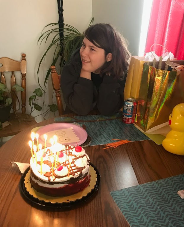 Thirteen year old girl celebrating a birthday.