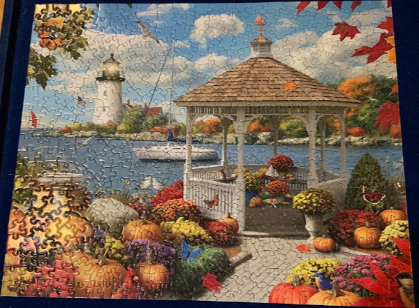 Lighthouse in the fall jigsaw puzzle.