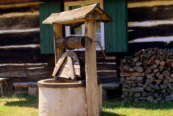 A wooden water well.