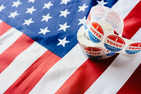 I voted today stickers on an American flag.