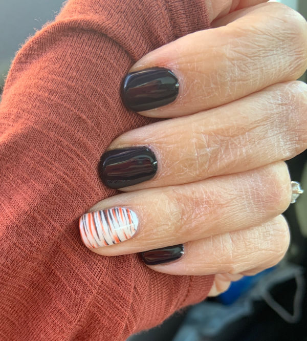 Black and orange nail art.