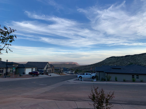 Wispy clouds in a blue sky.