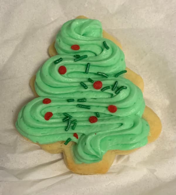 Christmas tree shaped sugar cookie.