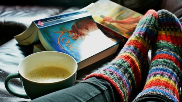 Fuzzy socks, books, and coffee.