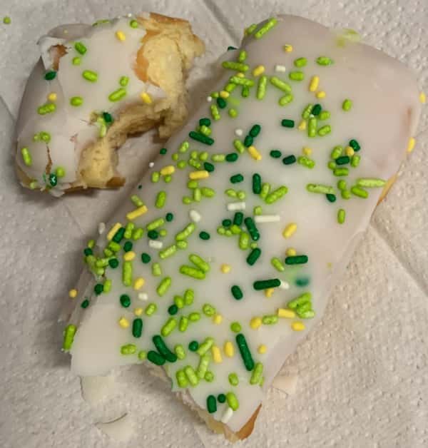 Donut with green sprinkles.