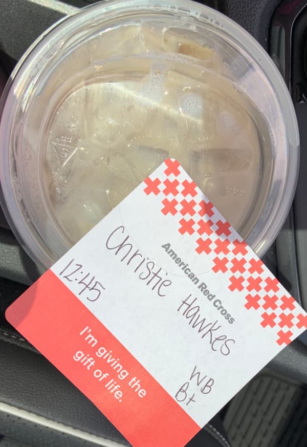 An iced latte and an American Red Cross name tag.