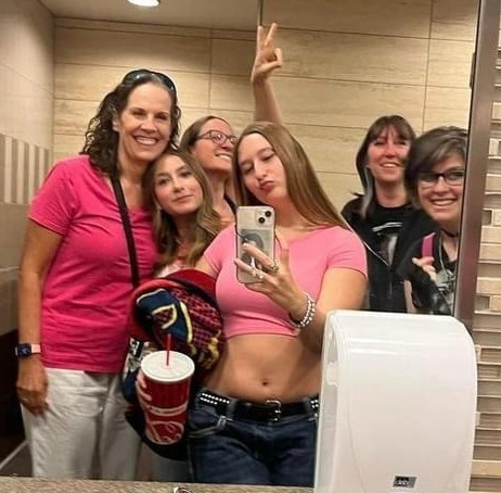 Selfie of six women at the Barbie movie.
