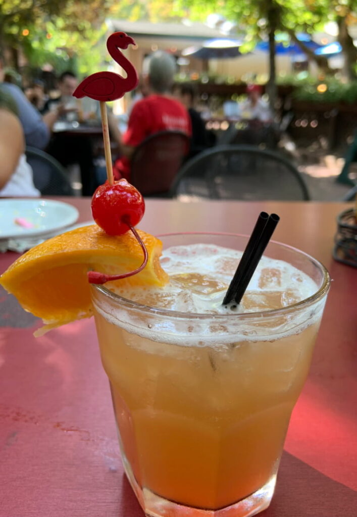 Cocktail with flamingo stir stick.