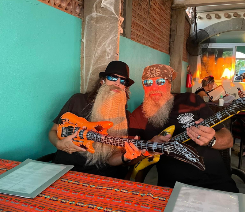 Couple dressed as ZZ Top at Halloween party.