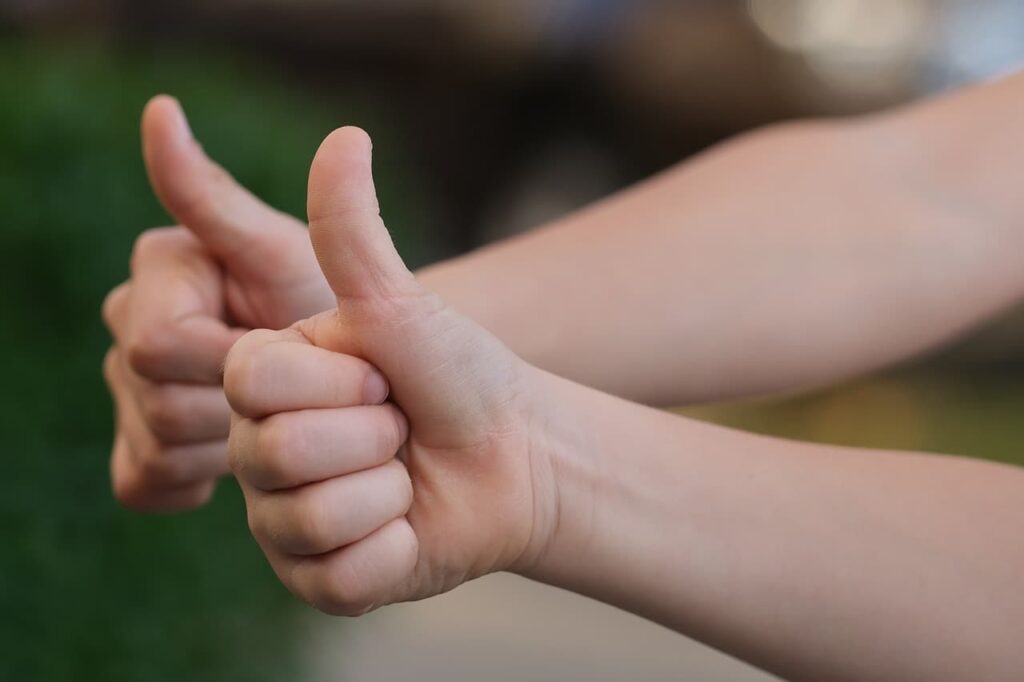 Two thumbs up.