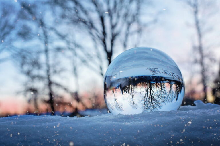 Globe reflecting snowy season.