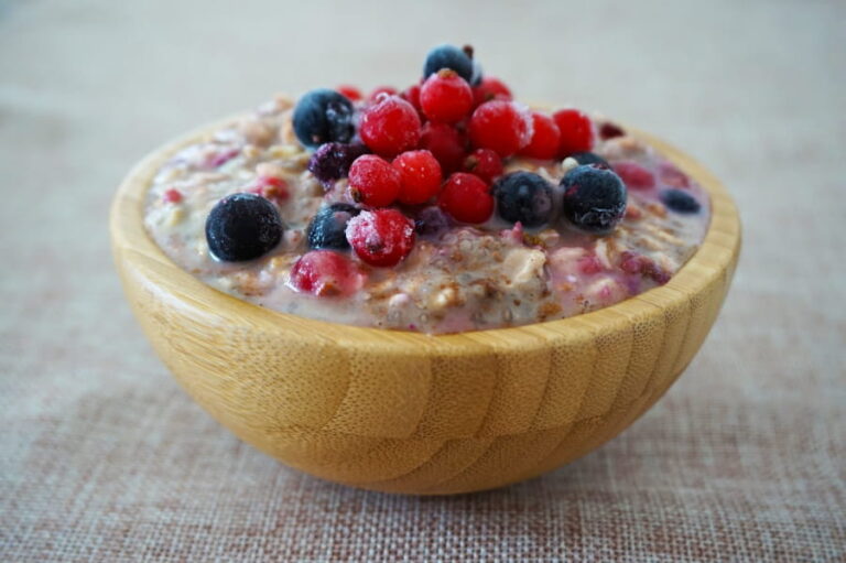 A bowl of overnight oats and berries.