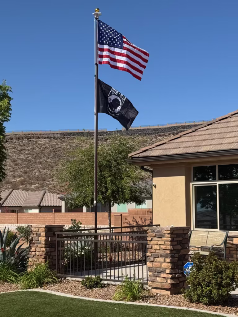 US flag and POW flag.