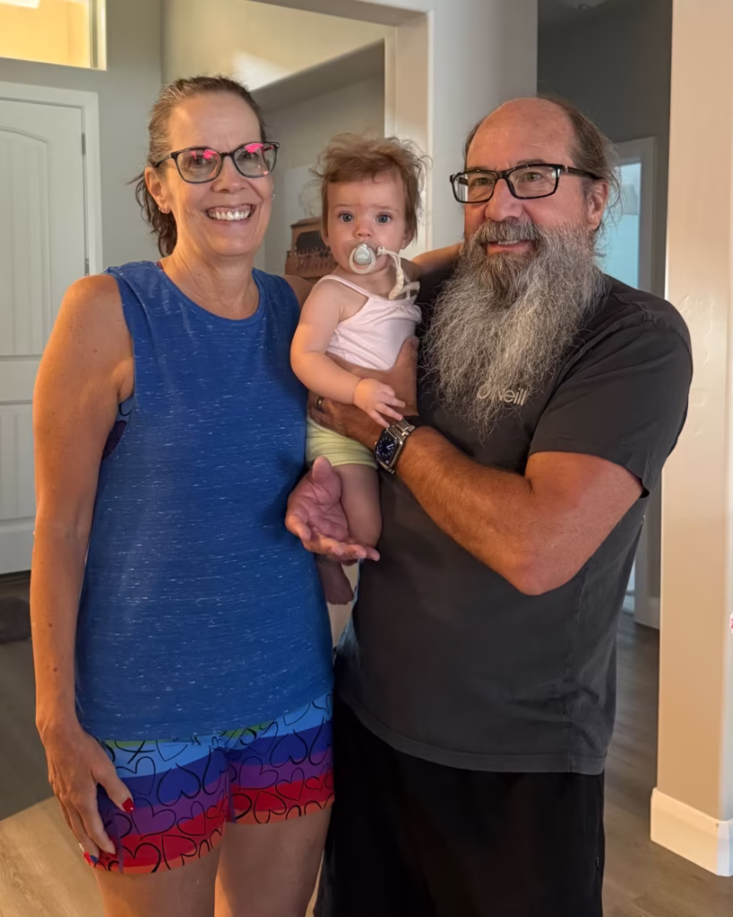 Grandparents with a baby.