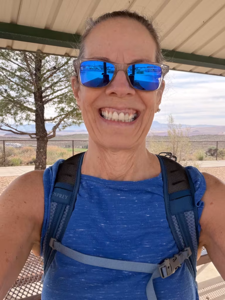 Woman hiking with a backpack.