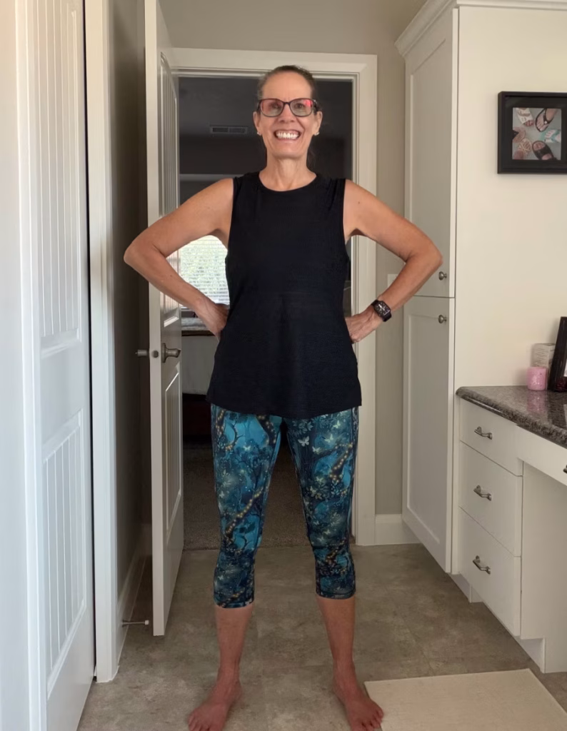 Woman wearing CVG Firefly Forest leggings.