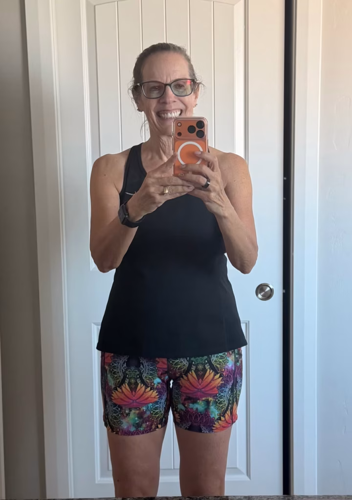 Woman in CVG Namaste All Day shorts.