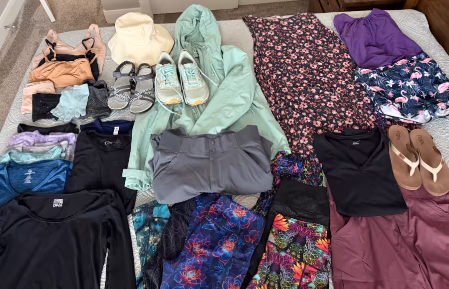 Clothing laid out for packing.