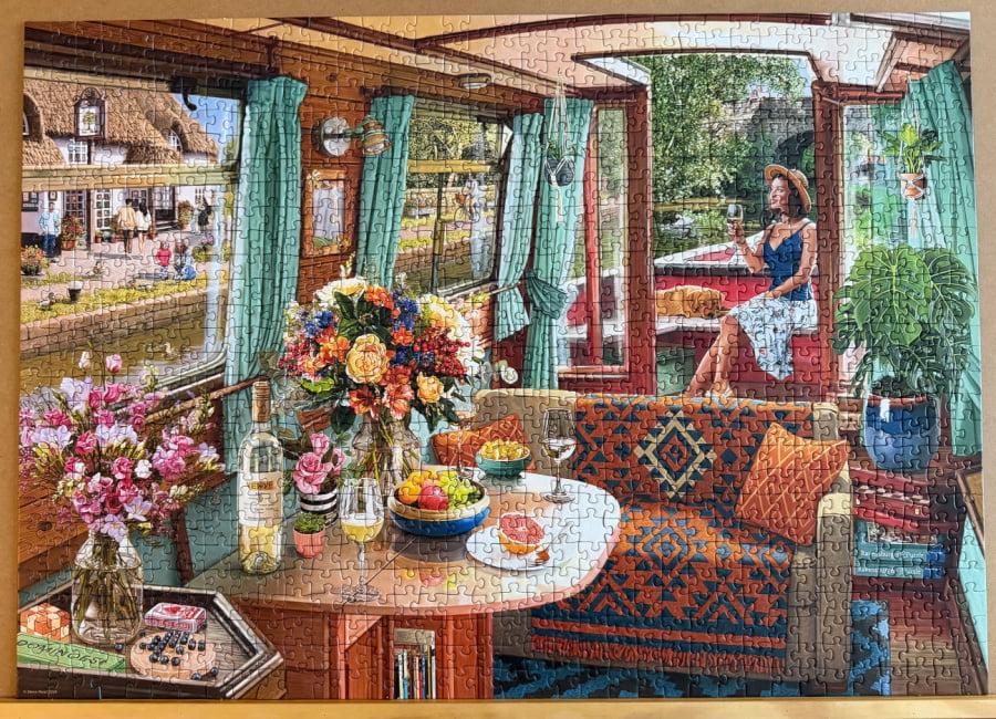 A jigsaw puzzle of a woman on a river cruise.