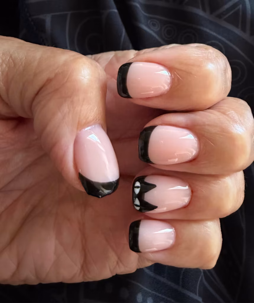 Halloween cat nail art.